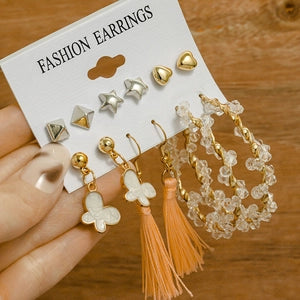 Golden Glow-Up: Tassels, Crystals & Cute Little Studs
